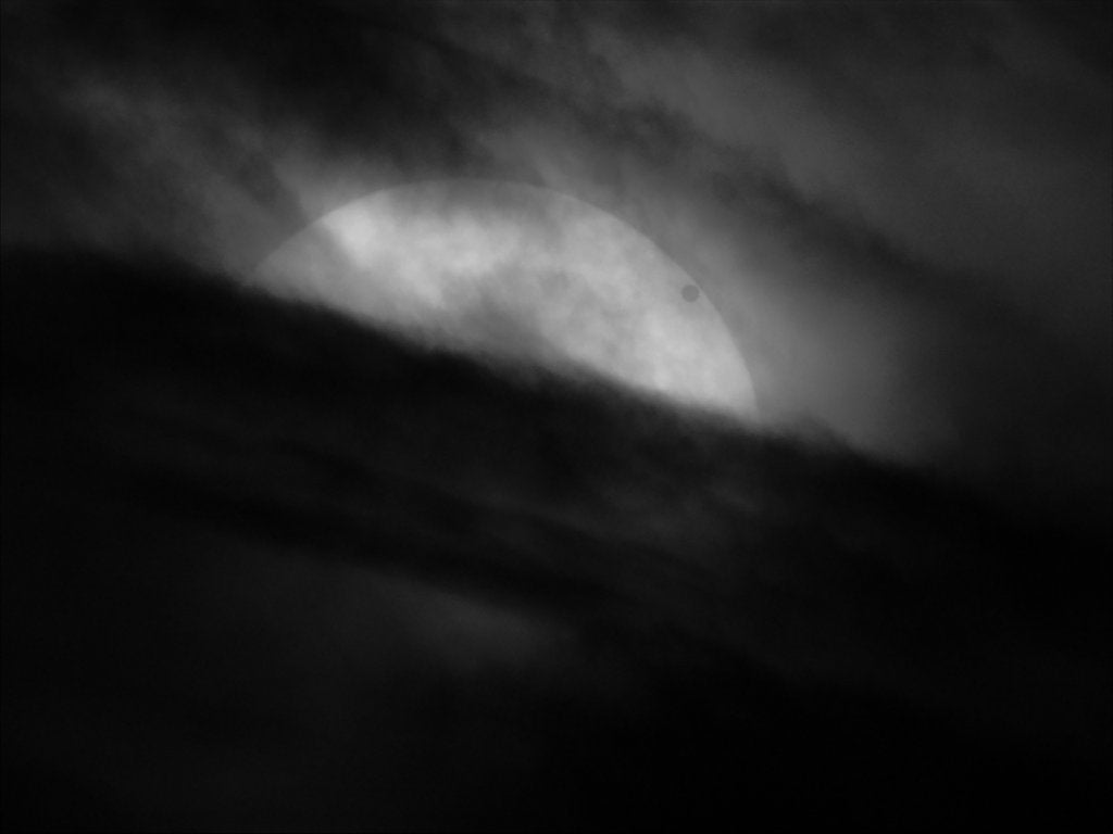 Detail of Transit of Venus 2012 in Hydrogen-Alpha by Chris Warren