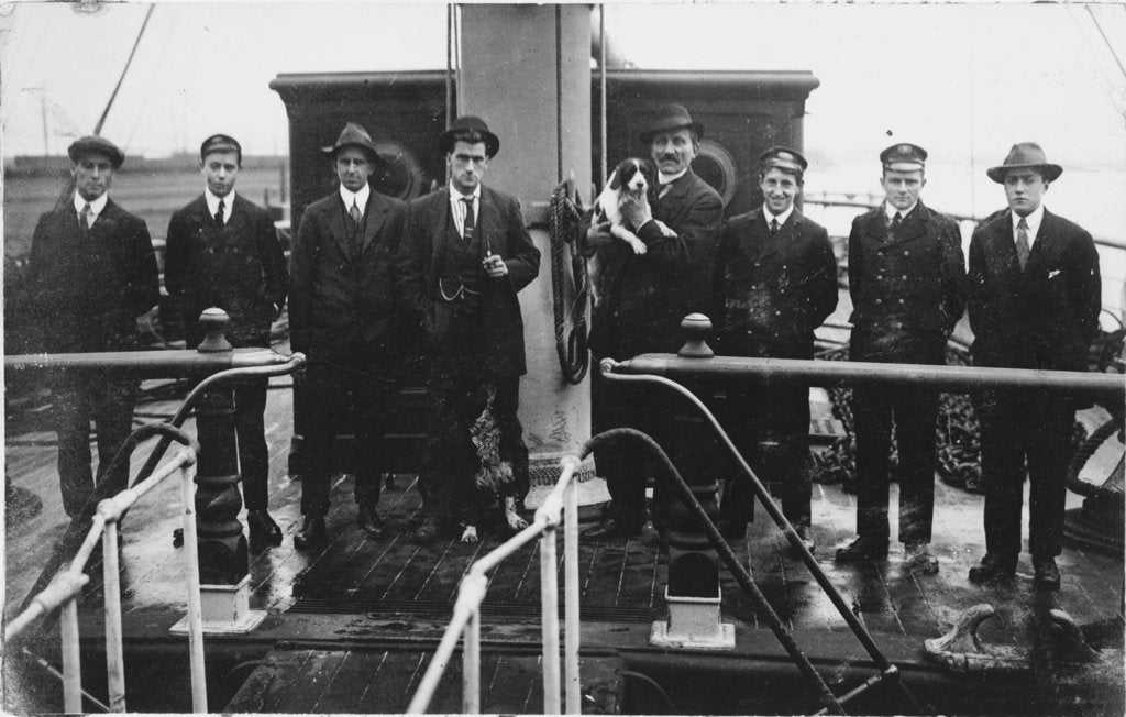 Detail of Group portrait including Captain H.J. Bray (with dog Ollie) and apprentices on deck, at Tacoma, USA by unknown