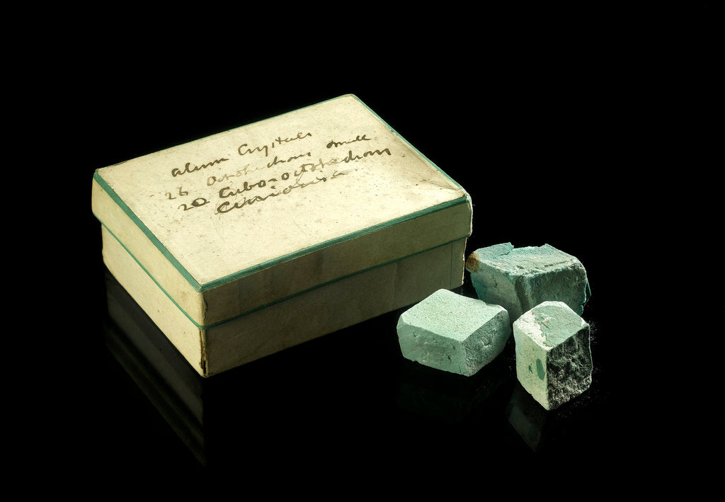 Detail of Box of six turquoise blue opaque crystals by unknown