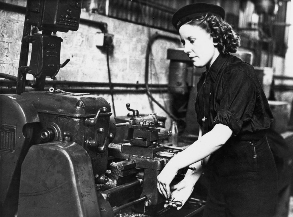 Detail of A Wren using a turning machine in the Second World War by unknown