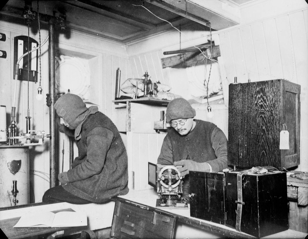 Detail of Hussey and James working in the laboratory on board 'Endurance' (1912) by unknown