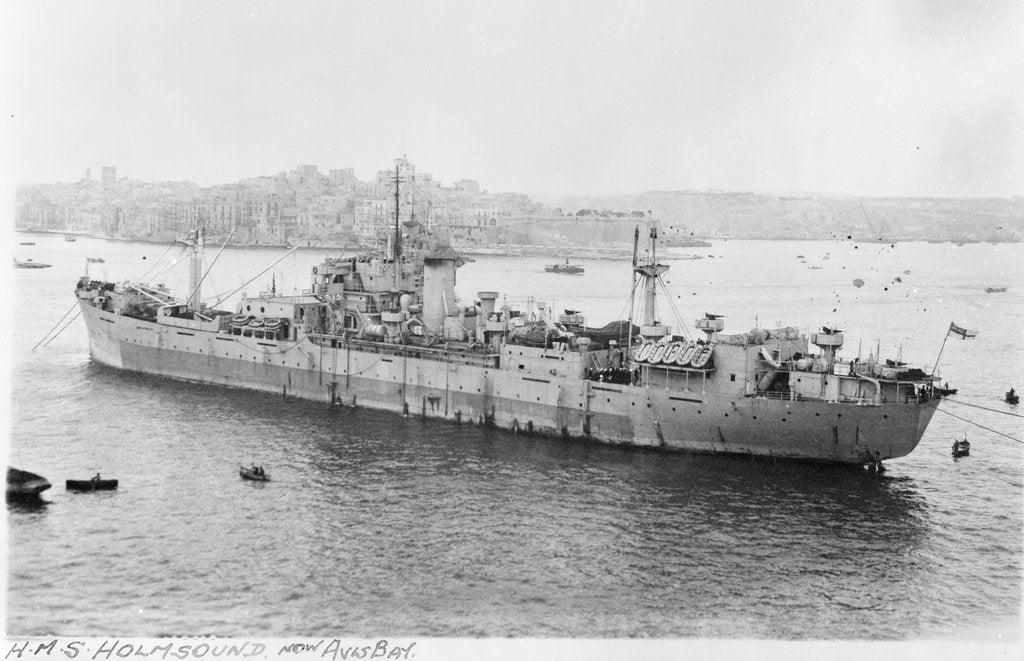 Detail of Photograph of the maintenance ship for aircraft components HMS 'Holm Sound' (1944) moored in Grand Harbour, Malta on 12th April 1946. Port side view just aft of the broadside. by unknown