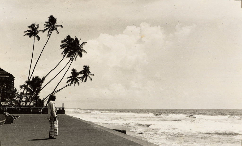 Detail of A landscape photograph of a Sri Lankan man looking out to sea. by unknown