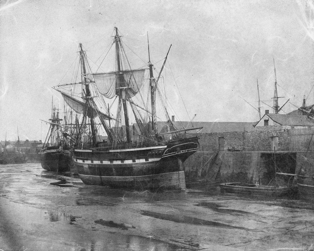 Detail of Stern quater view of copper ship and others aground at low tide by unknown