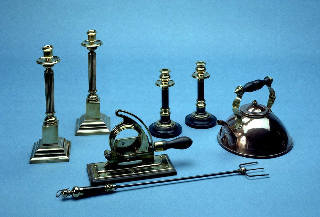 Detail of Copper kettle, brass candlesticks, tobacco cutter, toasting fork by Albert Edward Jew