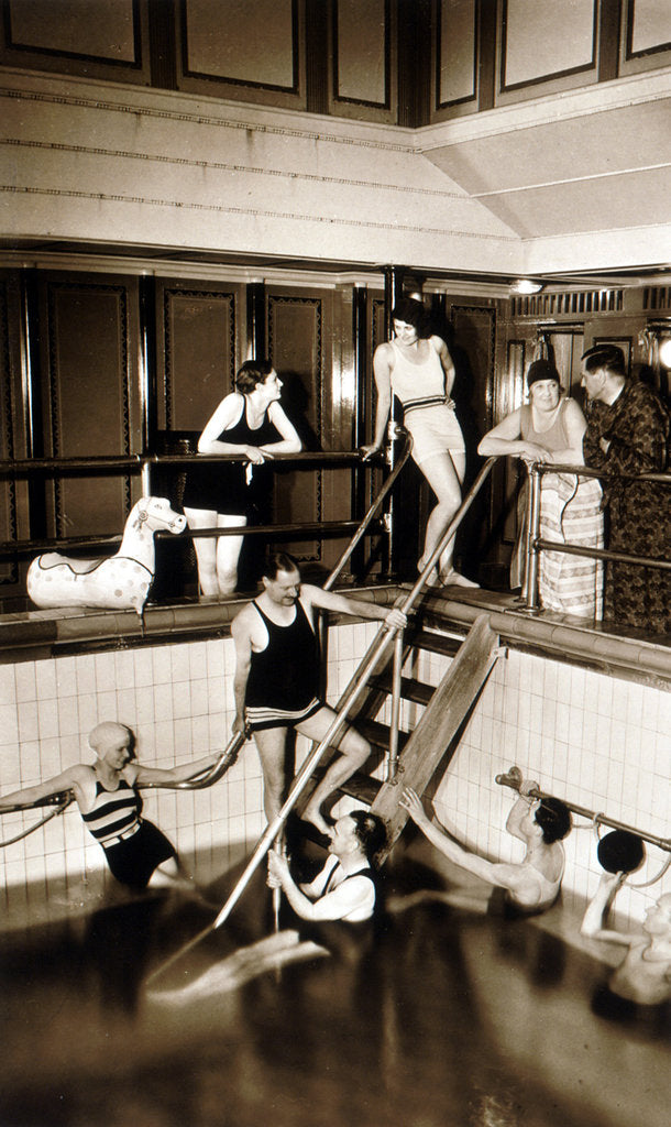 Detail of Passengers on aboard an unidentified cruise liner relax around the swimming pool in the very latest fashions by unknown