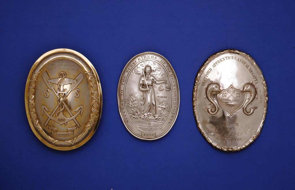 Detail of Arm badges by W. Mann