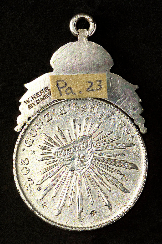Detail of Mexican dollar commemorating HMAS 'Sydney' and SMS 'Emden'; reverse by W. Kerr