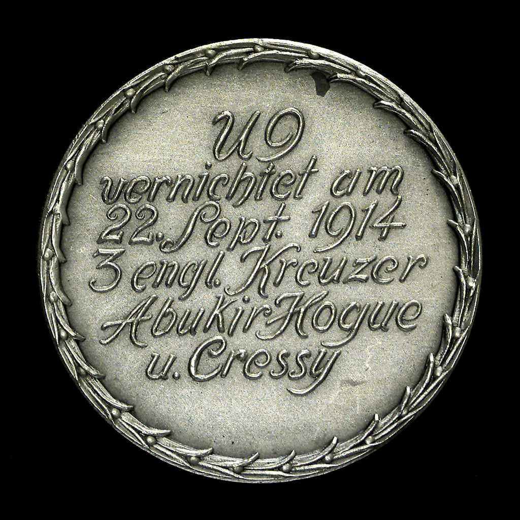 Detail of Medal commemorating the destruction of the English armoured cruisers 'Aboukir', 'Hogue' and 'Cressy' by 'U9', 1914; obverse by F. H.