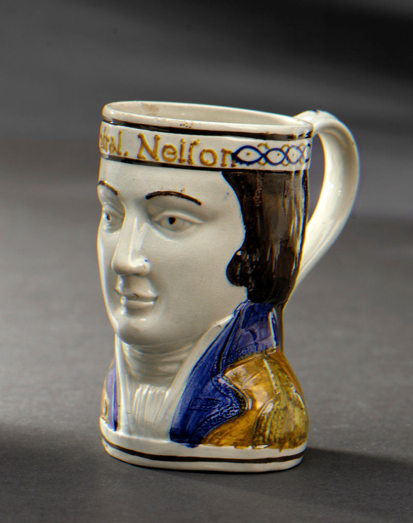 Detail of Earthenware mask mug by unknown