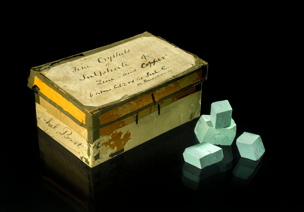 Detail of A box containing twenty one turquoise blue opaque crystals by unknown