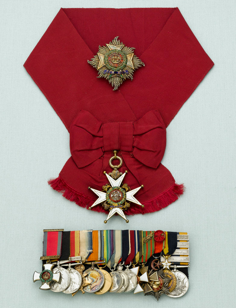 Detail of Medals awarded to Admiral of the Fleet, Earl David Beatty, on a presentation board, including a Sash, Badge and Star, and a bar of 14 medals, (left to right) MED2214-27 by unknown