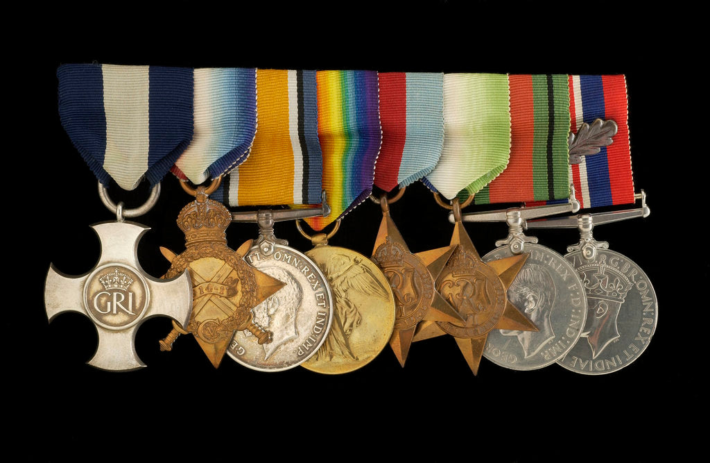 Detail of Medals awarded to Cdr J. L. Younghusband DSC (obverse, l to r, MED1228-1235) by Garrard & Co.