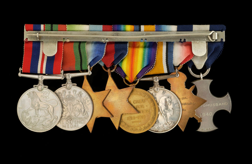 Detail of Medals awarded to Cdr J. L. Younghusband DSC (reverse, r to l, MED1228-1235) by Garrard & Co.