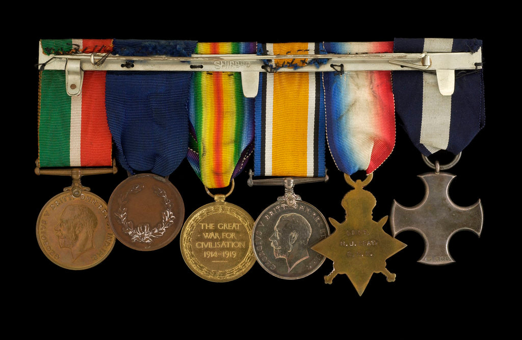 Detail of Medals awarded to Commander H. J. Bray DSC (reverse, right to left, MED1093-1098) by unknown