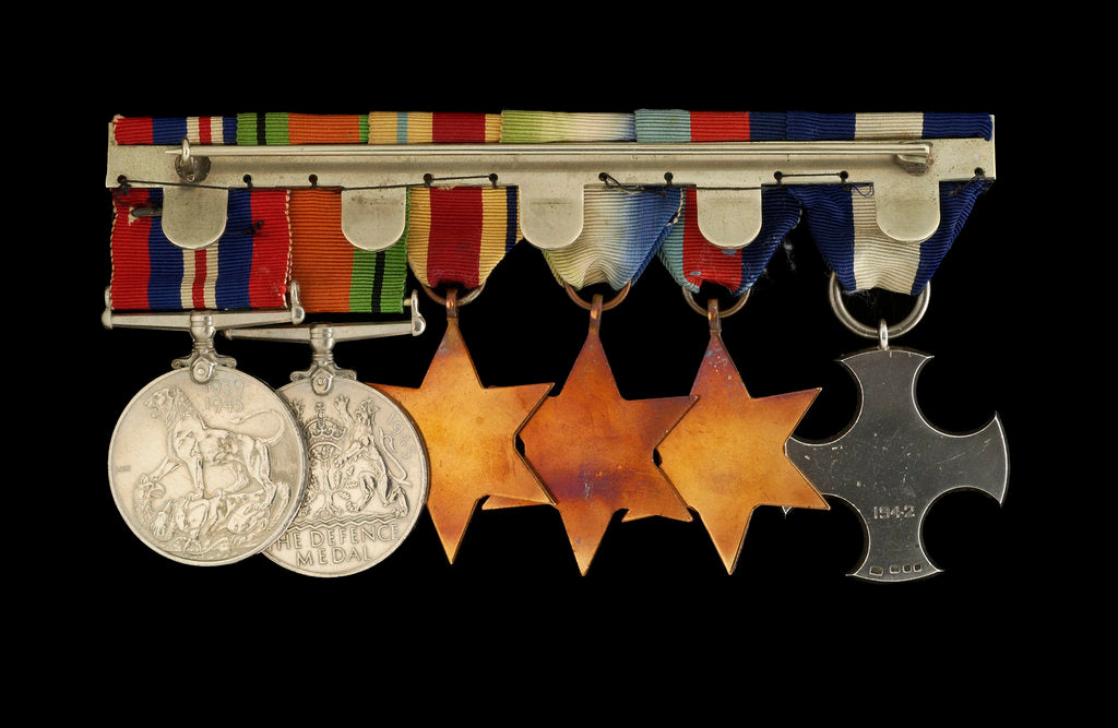 Detail of Medals awarded to Cdr Herbert J. P. Crousaz DSC (reverse, r to l, ZBA2252-2257) by unknown
