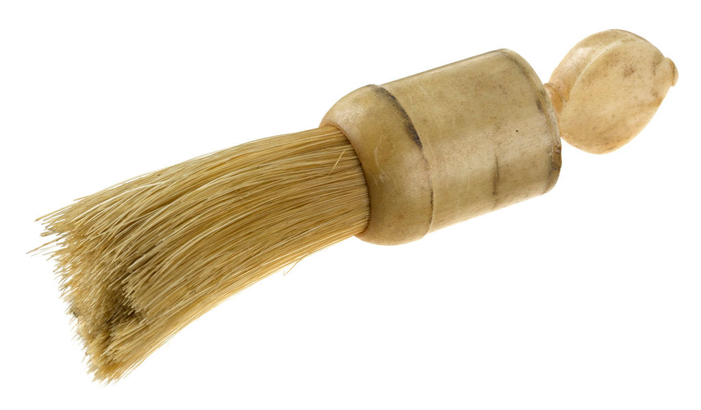 Detail of A whalebone-handled brush, possibly a shaving brush by unknown