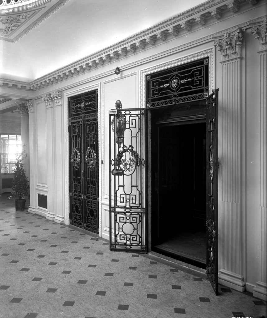 Detail of Passenger elevators in the Grand Entrance on the 'Aquitania' (1914) by Bedford Lemere & Co.