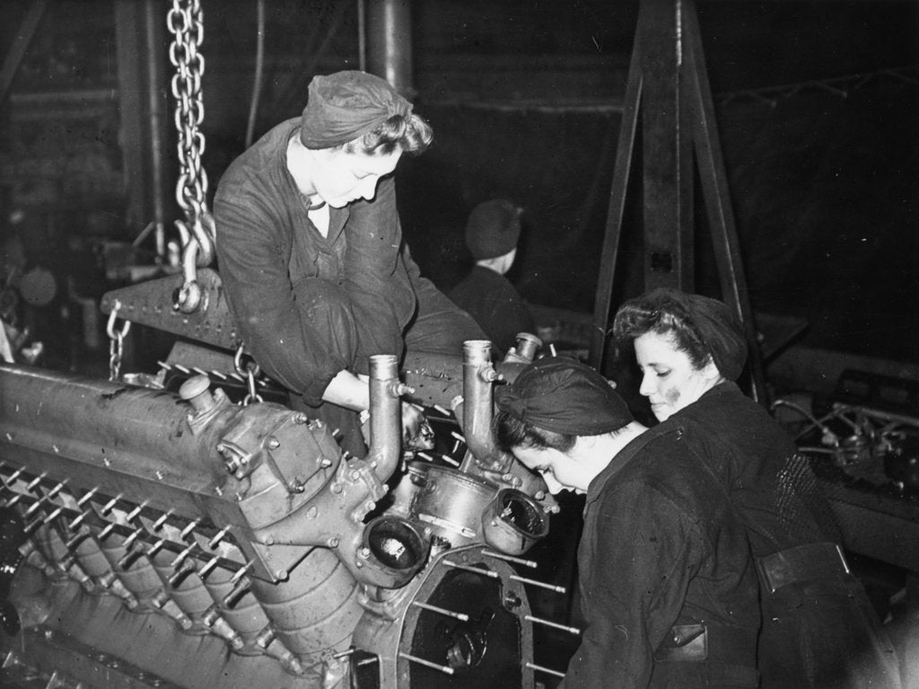 Detail of A WREN dismantling a large marine engine by unknown