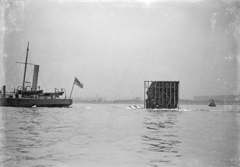 Detail of 'Excellent' (Br, 1883), forward half of vessel off picture, towing gunnery target by unknown