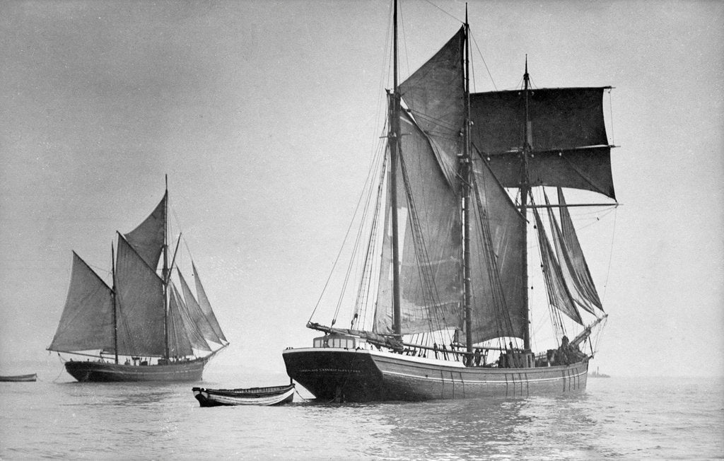 Detail of The 'Cumberland Lassie' (Br, 1874) under sail with large ketch in left background by unknown