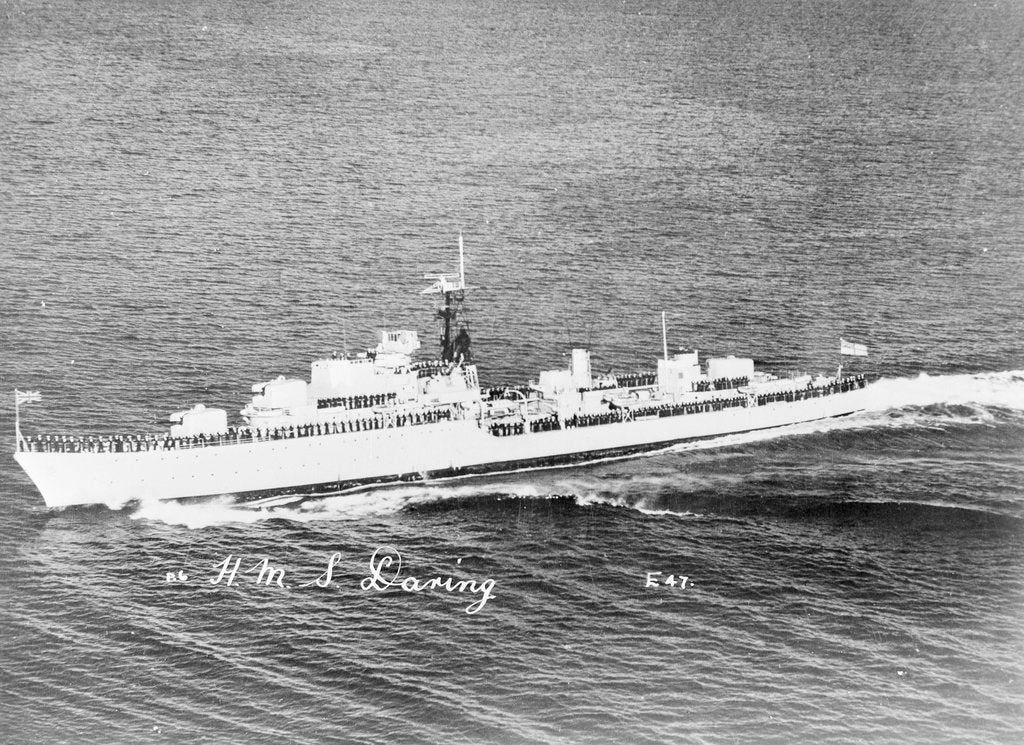 Detail of Destroyer HMS 'Daring' (1949) under way with crew in review order manning the ship by unknown