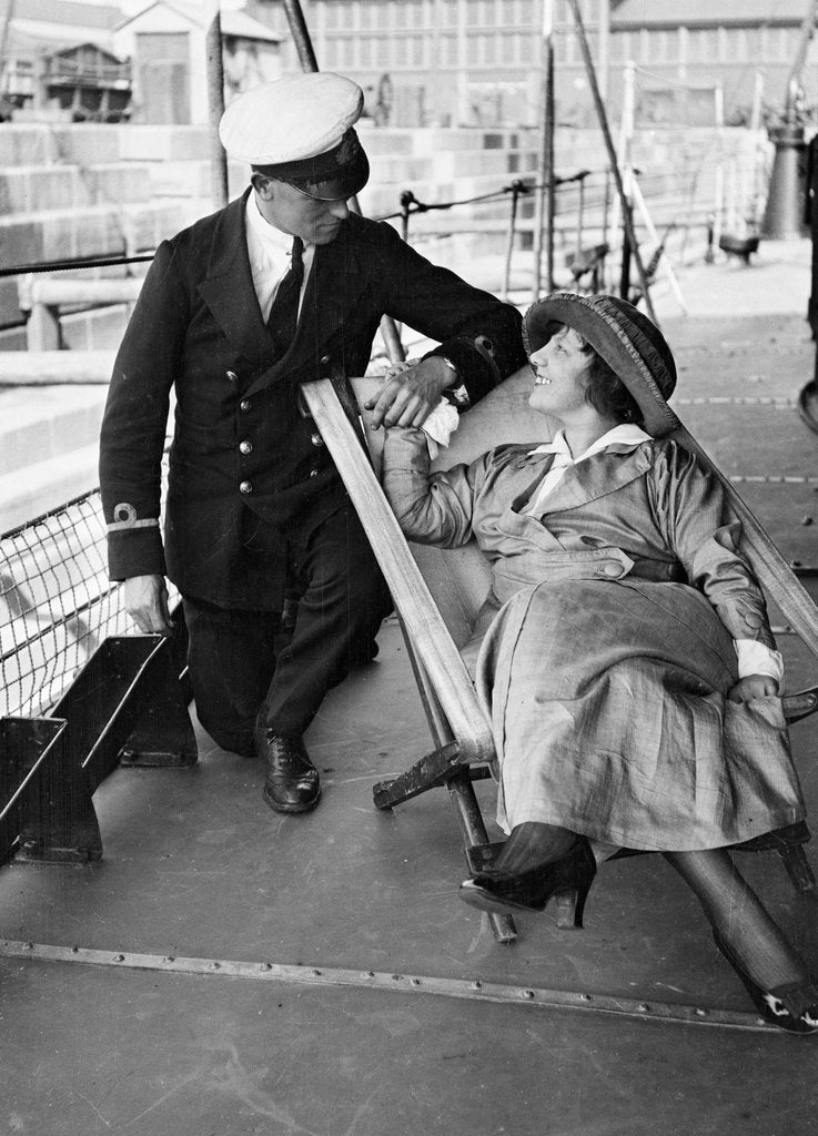 Detail of HMS 'Laforey' (1913), a couple on the ship, in dry dock by unknown