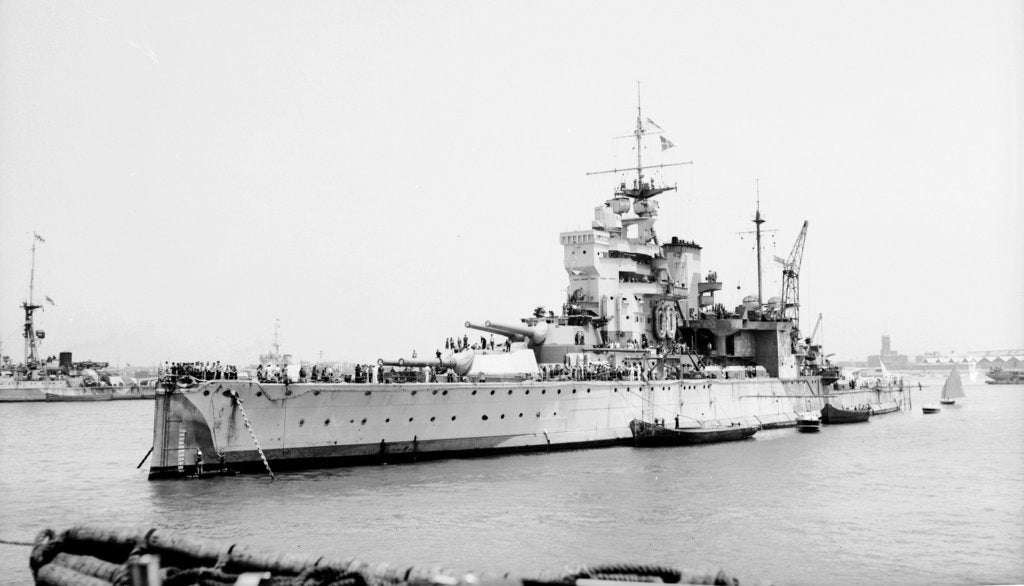 Detail of Battleship HMS 'Valiant' (1914) anchored in Alexandria harbour taking on ammunition by unknown