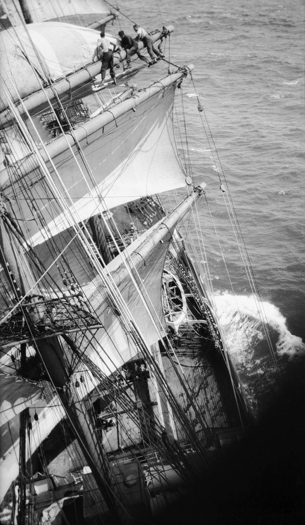 Detail of Changing the upper topgallant and royal sail on the main mast by Alan Villiers