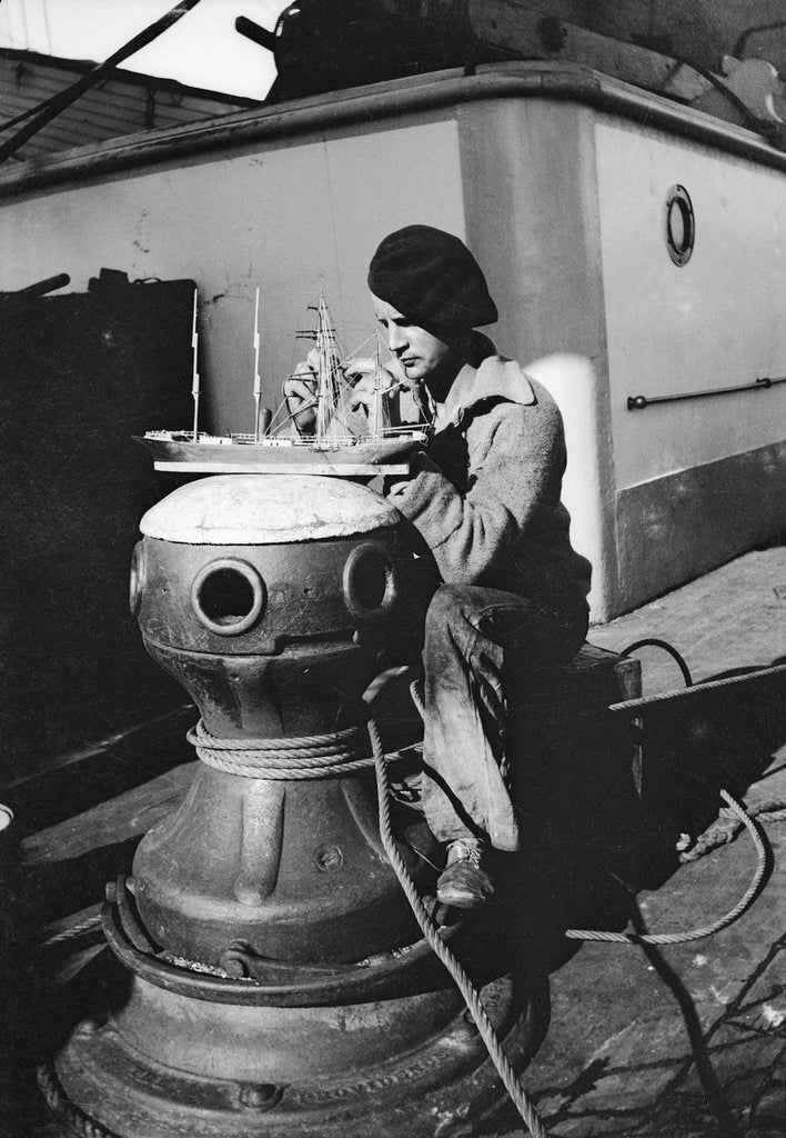 Detail of The Modelmaker working on a capstan head by Alan Villiers