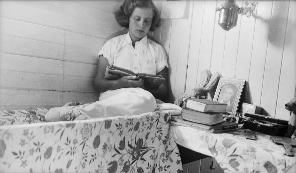 Detail of Elizabeth Jacobsen in her bunk by Alan Villiers