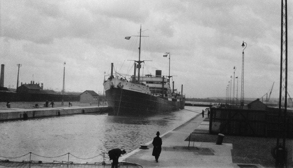 Detail of 'Radnorshire' (Br, 1919) cargo liner, Royal Mail Steam Packet Co., in King George V Dock lock, London by unknown