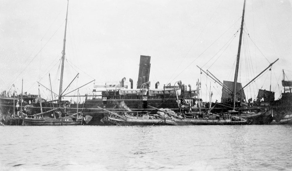 Detail of 'Sakura Maru' (Ja, 1887) at moorings, junks alongside by unknown