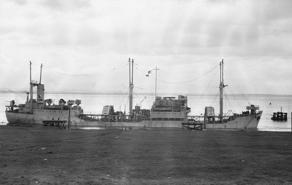 Detail of A starboard broadside view of 'Empire Crest' (1944) lying at dolphins by unknown