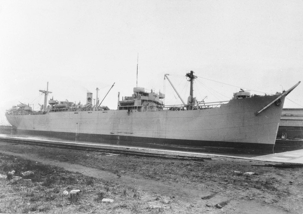 Detail of 'Empire Prowess' (Br, 1943) at quayside by unknown
