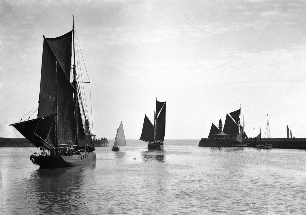 Detail of The trawler 'Roma' (1906) [LT410] with an unidentified trawler sailing out of the outer harbour at Lowestoft, Suffolk by Smiths Suitall Ltd.