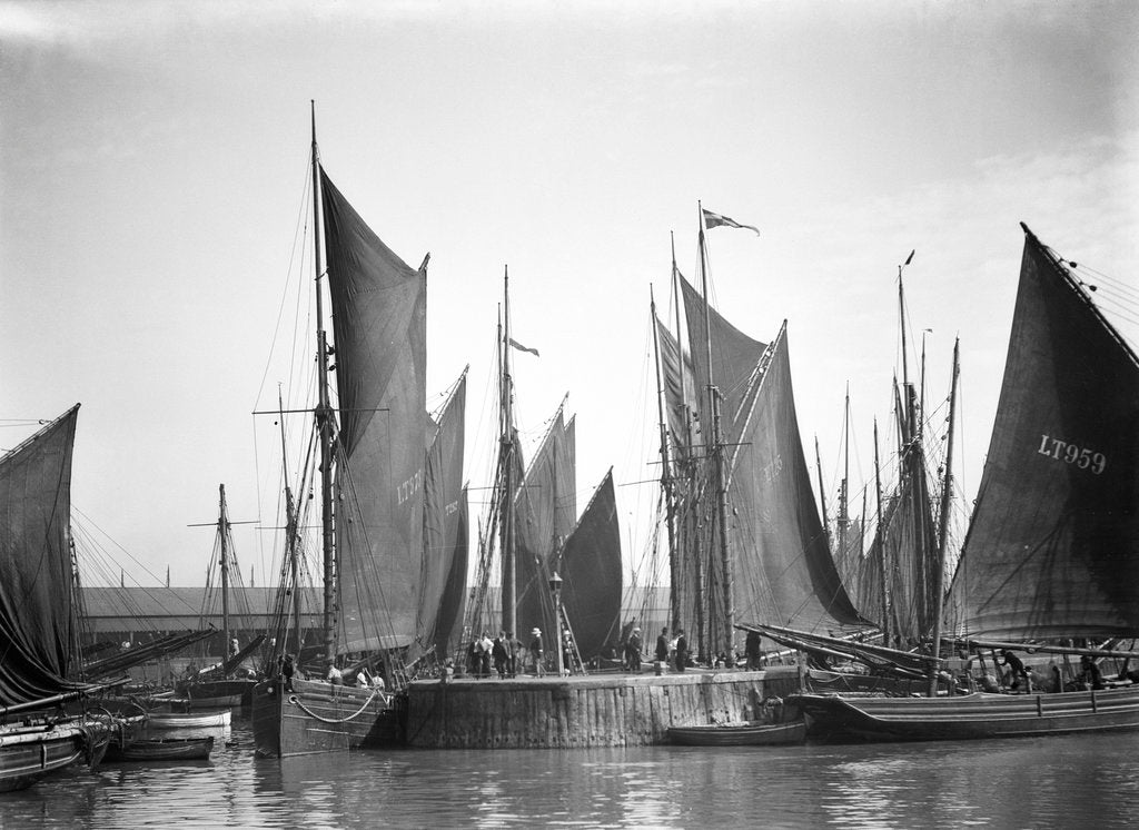 Detail of A view across Lowestoft harbour to the entrance of the trawl basin in the morning by Smiths Suitall Ltd.