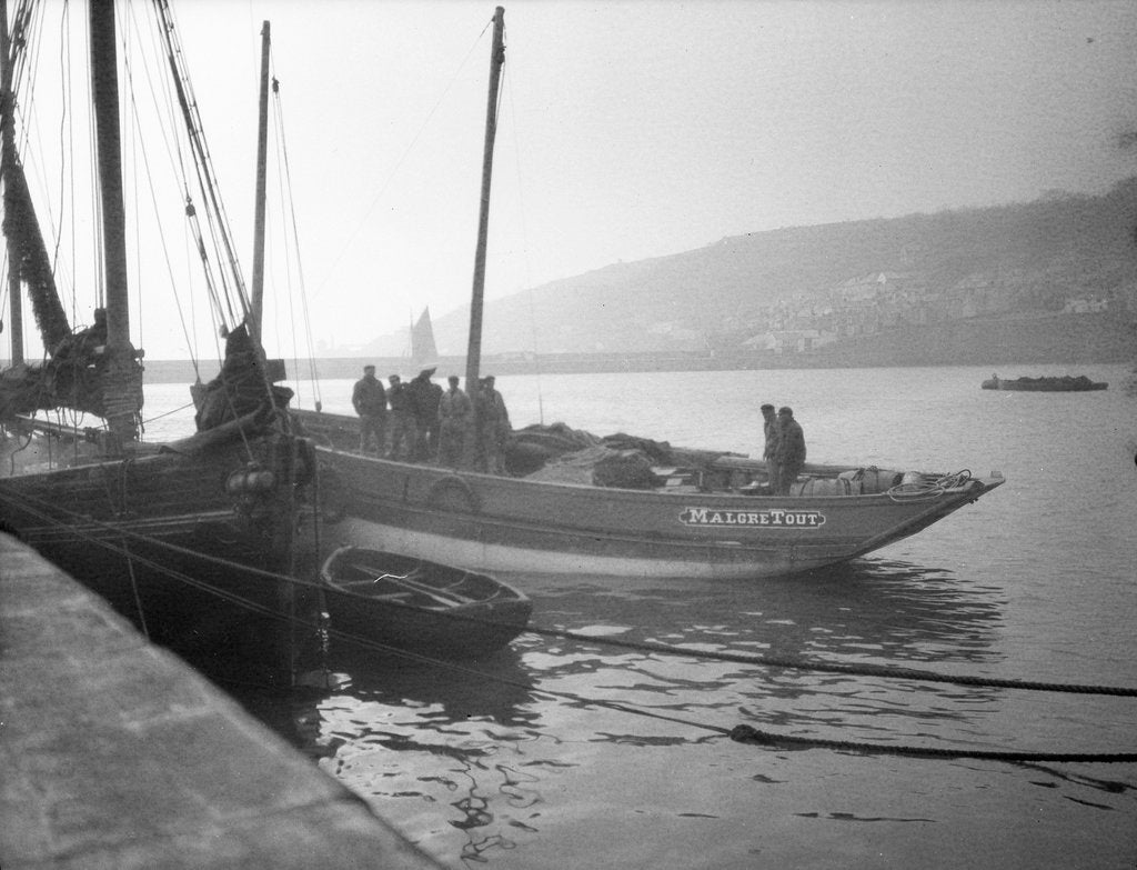Detail of 'Malgre Tout' (Fr, 1920s) moored at quayside, Newlyn, bows obscured by unknown