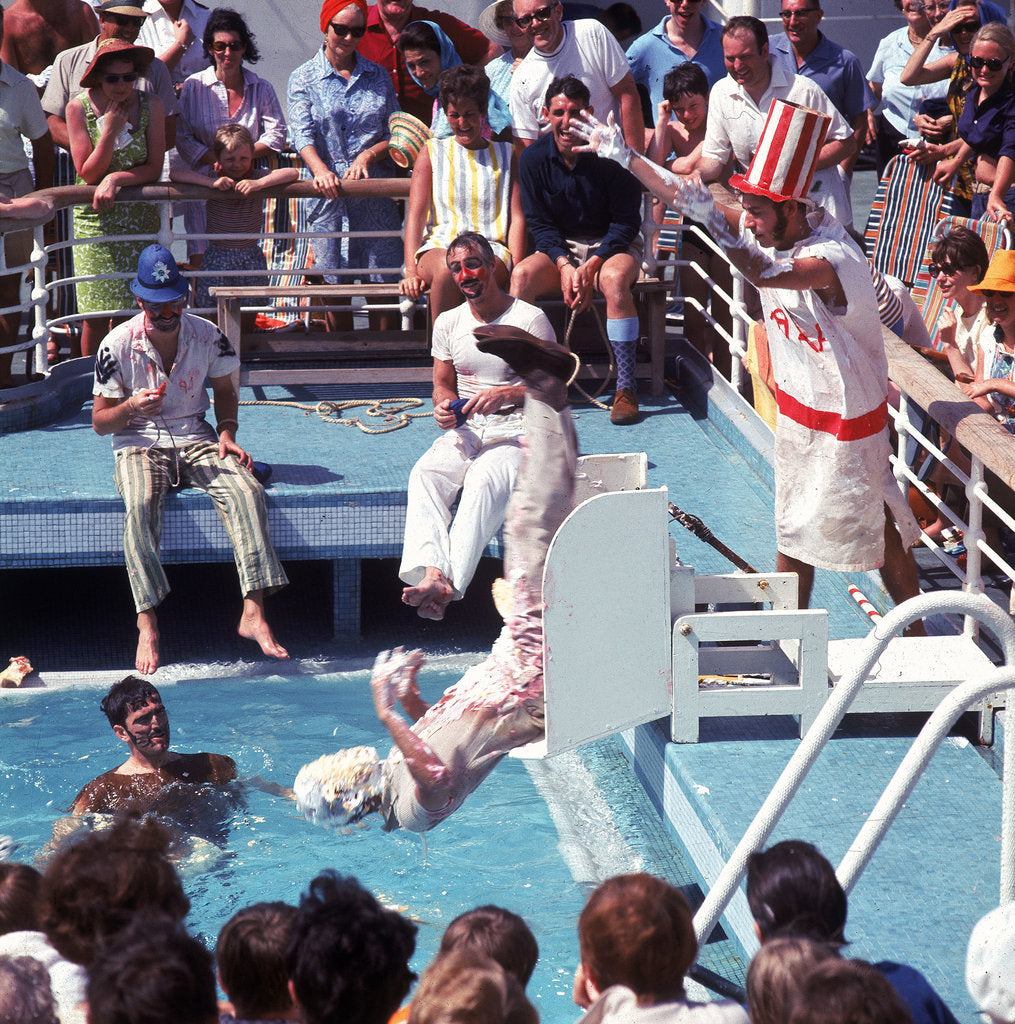 Detail of Comic entertainment involving silly costumes, fake blood and much splashing by Marine Photo Service