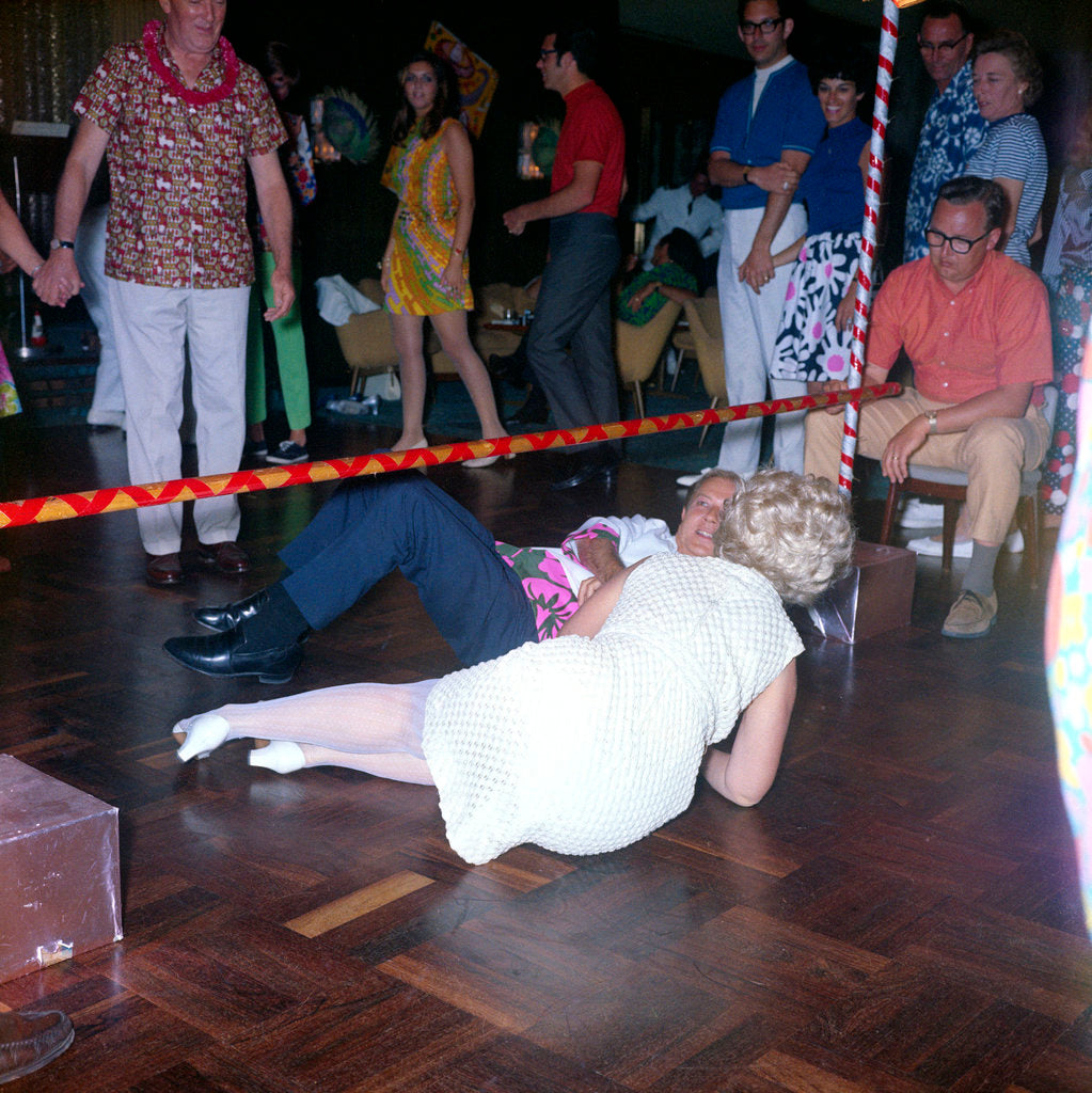 Detail of Passengers go under the limbo stick aboard the liner 'Gripsholm' by Marine Photo Service