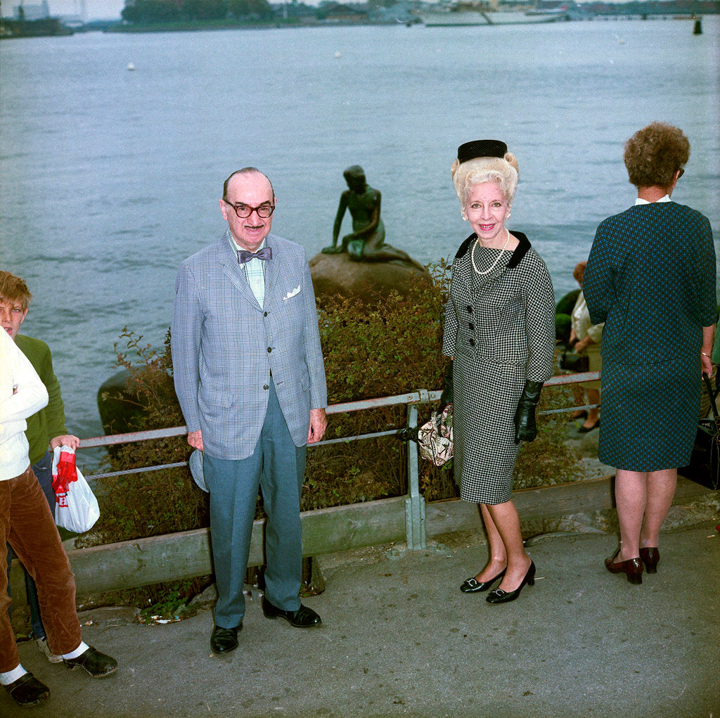 Detail of Unidentified couple posing in front of the Mermaid sculpture, Copenhagen, Denmark by Marine Photo Service
