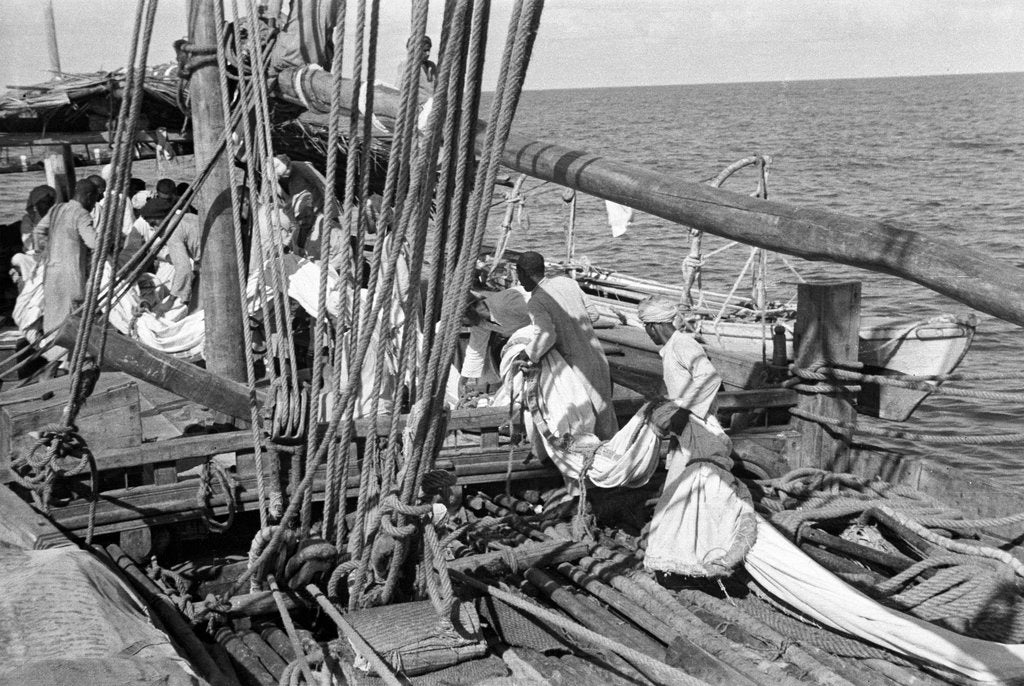 Detail of Bringing the mizzen sail along to bend to the mizzen yard by Alan Villiers