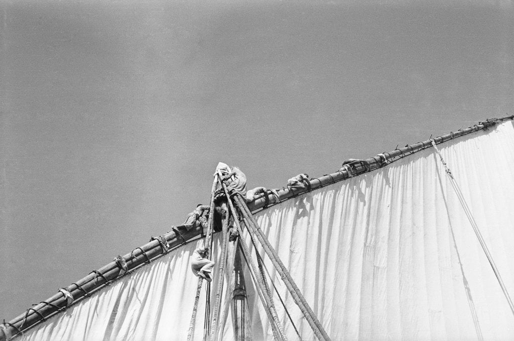 Detail of Kuwaiti sailors working the sail by Alan Villiers