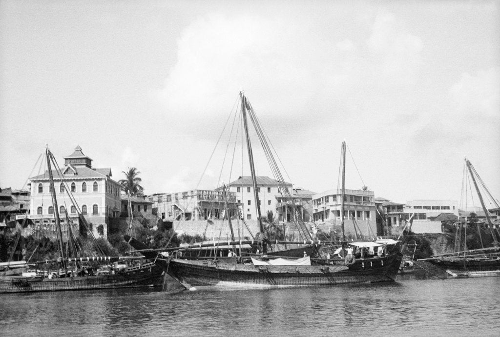 Detail of Booms anchored along the waterfront at Mombasa, Kenya by Alan Villiers