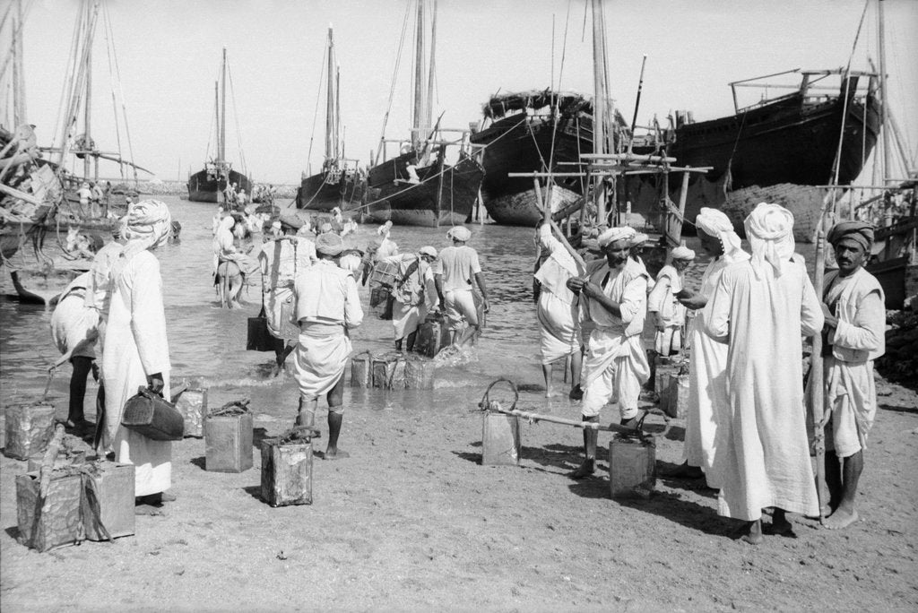 Detail of Water carriers filling their cans by Alan Villiers