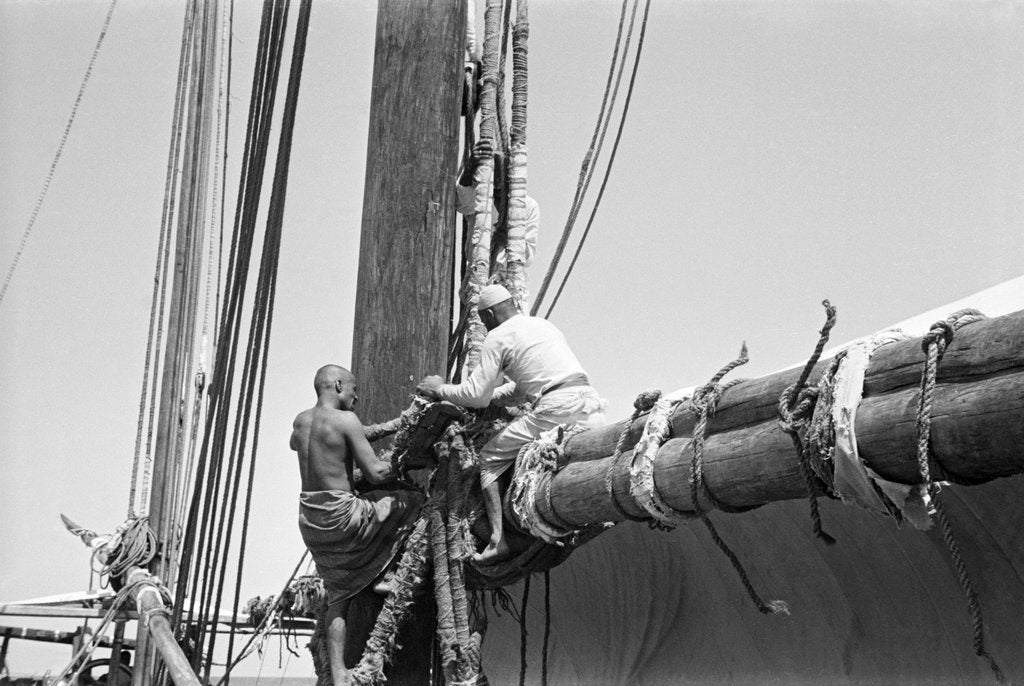 Detail of Sailors bend the halyards of the mainsail, Zanzibar by Alan Villiers