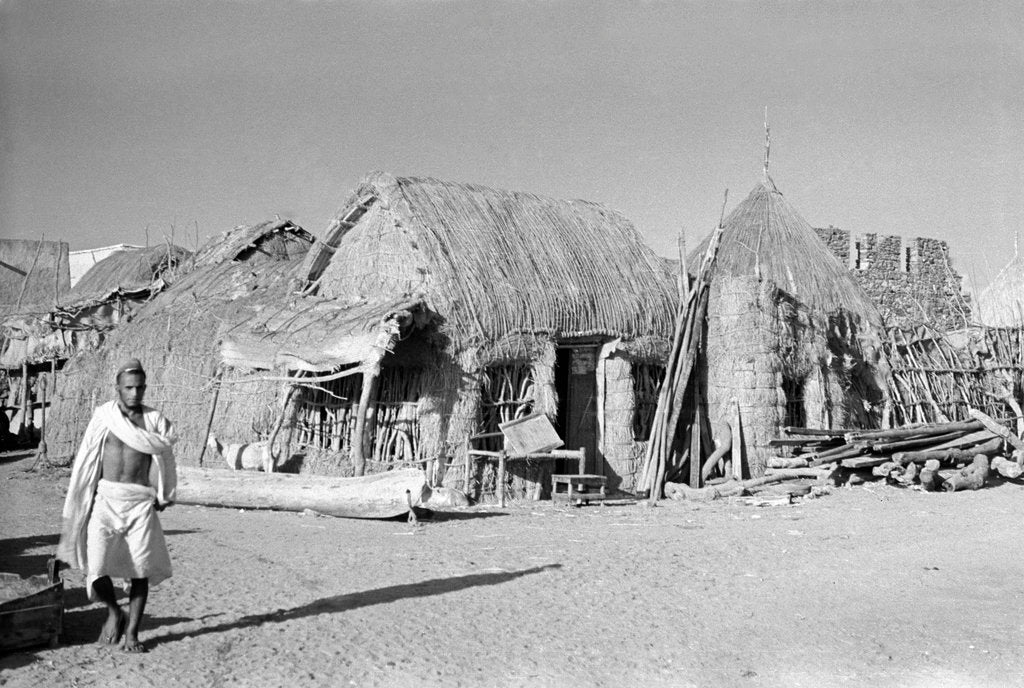 Detail of Jizan market with 'ushshah' houses by Alan Villiers