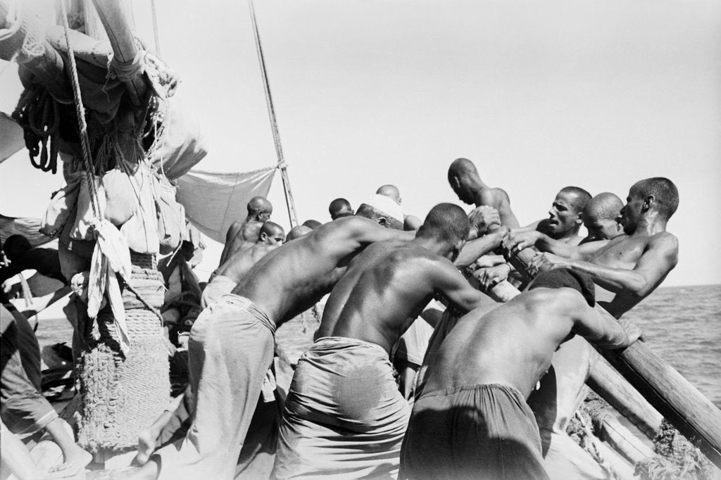 Detail of Crew rowing a pearler by Alan Villiers