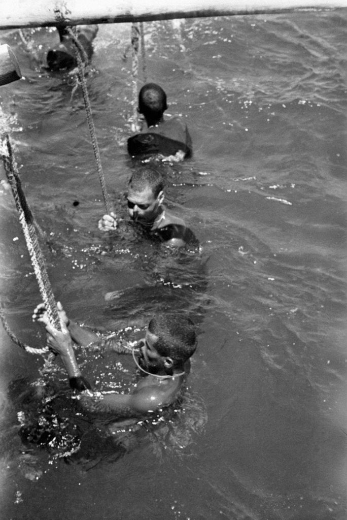 Detail of Kuwaiti pearl divers at rest by Alan Villiers