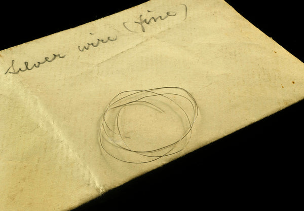 Silver wire in an envelope posters & prints by unknown